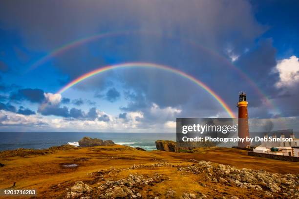 butt of lewis lighthouse and rainbow scotland - rainbow stock pictures, royalty-free photos & images