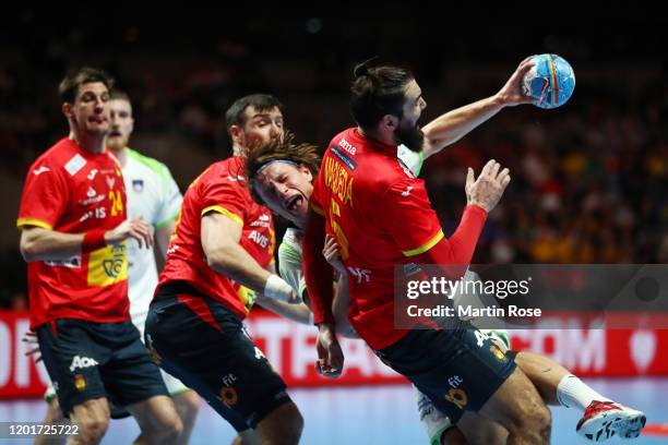 Jure Dolenec of Slovenia is challenged by Jorge Maqueda Peno of Spain during the Men's EHF EURO 2020 semi final match between Spain and Slovenia at...