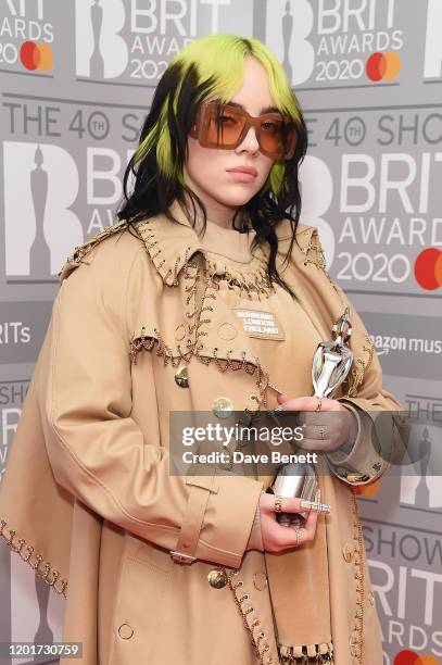 Billie Eilish, winner of the Best International Female Solo Artist award, poses in the winners room at The BRIT Awards 2020 at The O2 Arena on...