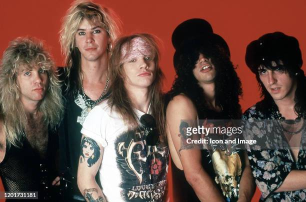 Drummer Steven Adler, Duff McKagan, vocals Axl Rose, guitarist Slash and guitarist Izzy Stradlin of the music group Guns N' Roses pose for a portrait...