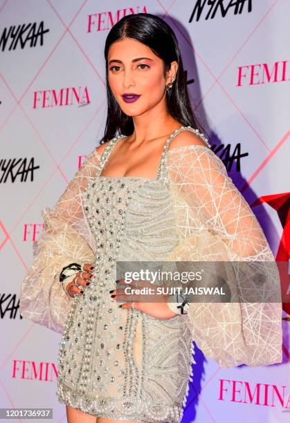 In this picture taken on February 18 Bollywood actress Shruti Haasan poses for photographs as she arrives at the 'Nykaa Femina Beauty Awards 2020' in...