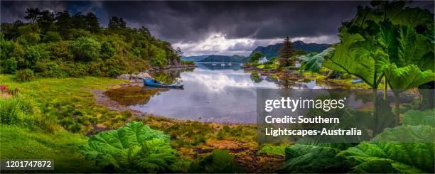 a view in the beautiful village of plockton on the shores of loch carron, western highlands, scotland, united kingdom - loch carron stock pictures, royalty-free photos & images