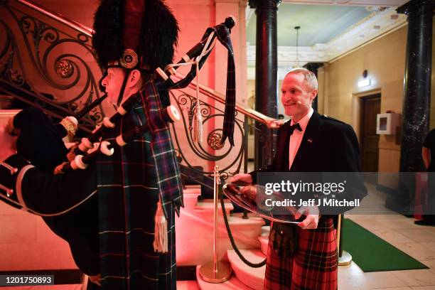 James Brodie holds the haggis during the Burns & Beyond traditional Burns Supper in the Freemasons Hall on January 24, 2020 in Edinburgh, Scotland....