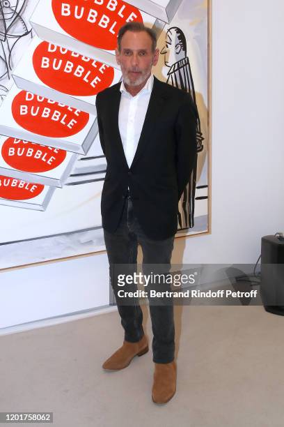 Artist David Salle poses in front of his work during the Party for his Exhibition at Thaddaeus Ropac Gallery, on January 24, 2020 in Paris, France.