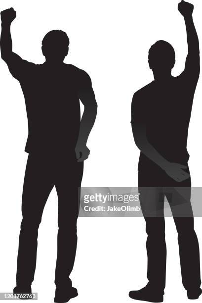 two men with raised fists silhouettes - protestor stock illustrations
