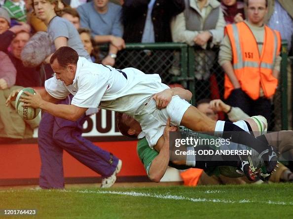 English Rugby Union player Austin Healey leaps to score a try during ...
