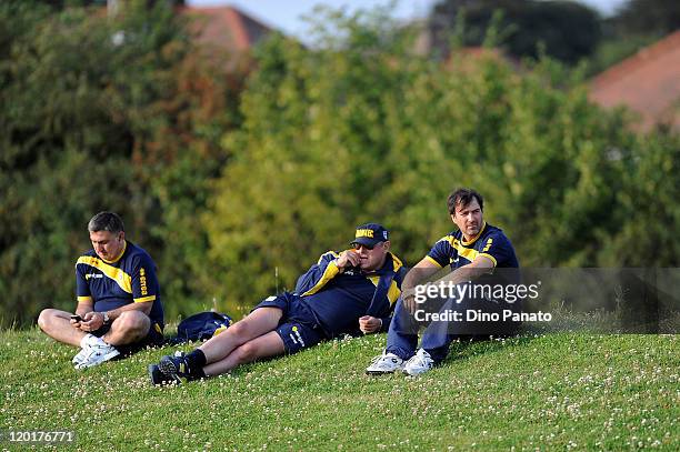 Team manager Alessandro Melli, general manager Pietro Leonardi and technical manager Antonello Preiti of Parma look on during a pre-season training...