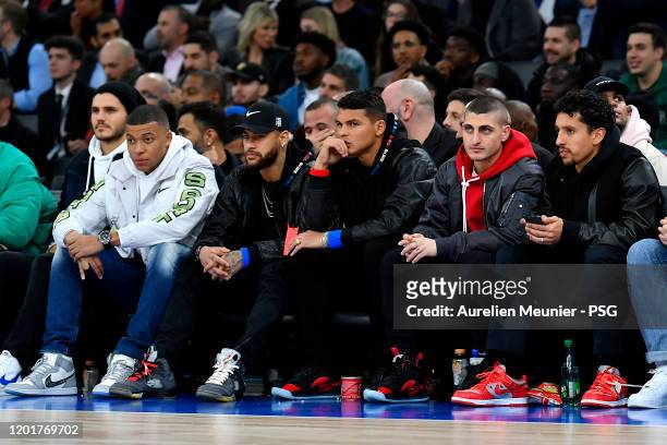 Kylian Mbappe, Neymar Jr, Thiago Silva, Marco Verratti and Marquinhos of Paris Saint-Germain attend the NBA match between Milwaukee Bucks and...