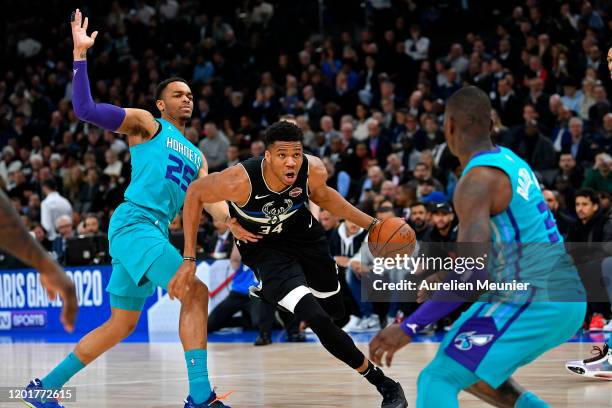 Giannis Antetokounmpo of the Milwaukee Bucks runs with the ball during the NBA Paris Game match between Charlotte Hornets and Milwaukee Bucks on...