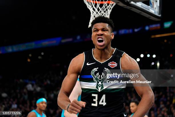 Giannis Antetokounmpo of the Milwaukee Bucks reacts after a dunk during the NBA Paris Game match between Charlotte Hornets and Milwaukee Bucks on...