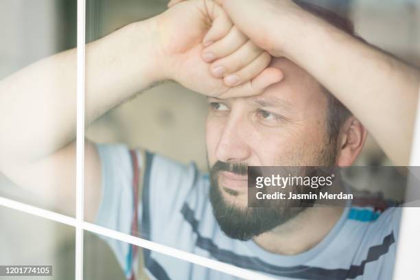 man on window - guilt stock pictures, royalty-free photos & images