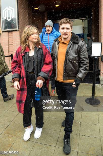 Actors Emily Skeggs and Kyle Gallner walk on Main Street on January 24, 2020 in Park City, Utah.