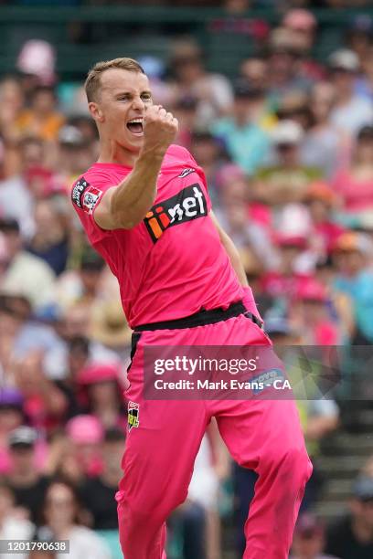 Tom Curran of the Sixers celebrates the wicket of during the Big Bash League match between the Sydney Sixers and the Melbourne Renegades at the...