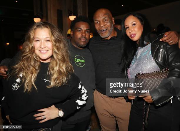 Joy Enriquez, Rodney Jerkins, Mike Tyson and Kiki Tyson attend Primary Wave x Island Records presented by Mastercard at 1 Hotel West Hollywood on...