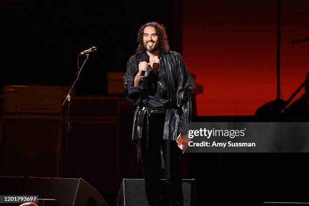 Host Russell Brand speaks onstage during MusiCares Person of the Year honoring Aerosmith at West Hall at Los Angeles Convention Center on January 24,...