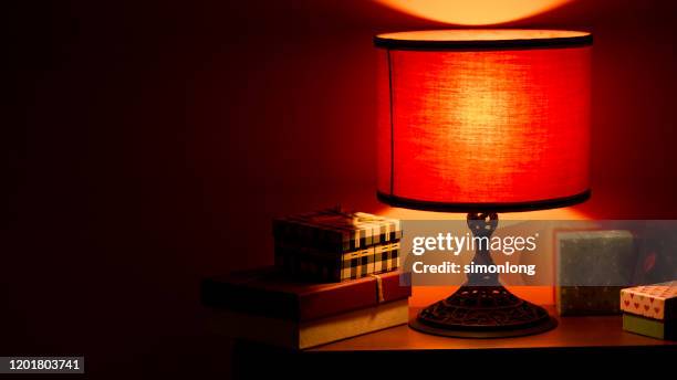 lamp night light in a dark background - lamp shade stockfoto's en -beelden