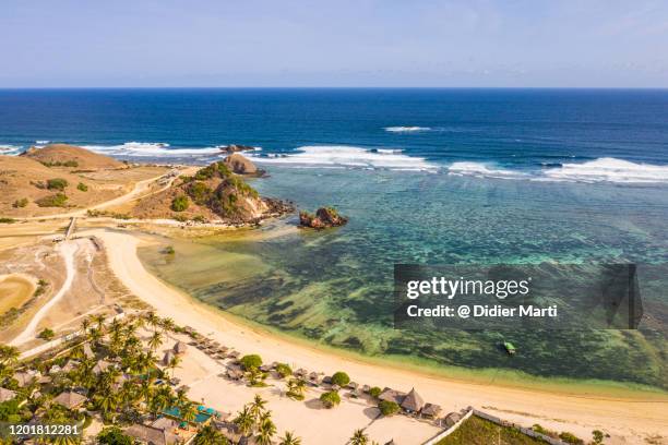 aerial view of an idyllic beach in the kuta area in south lombok in indonesia - kuta stock pictures, royalty-free photos & images