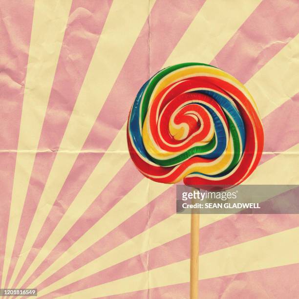 swirl lollipop and candy wrapper - candy wrapper stock-fotos und bilder