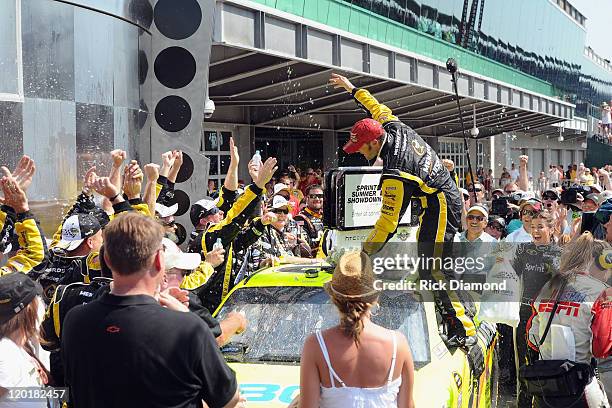 Brickyard 400 Winner Paul Menard celebrates at the Brickyard 400 presented by BigMachineRecords.com at Indianapolis Motorspeedway on July 31, 2011 in...