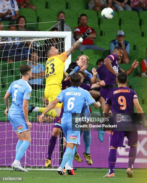 Melbourne City goalkeeper Dean Bouzanis punches the ball away from goal during the round 16 A-League match between Melbourne City and the Perth Glory...