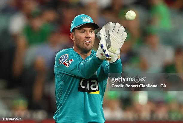 Ab de Villiers of the Brisbane Heat takes the ball during the Big Bash League match between the Melbourne Stars and the Brisbane Heat at the...