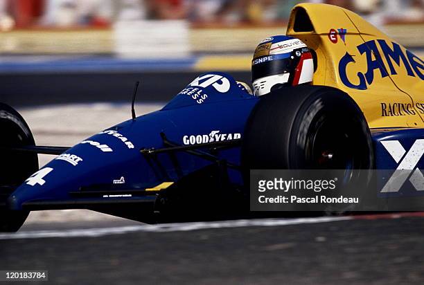 Jean Alesi drives the Tyrrell Racing Organisation Tyrrell 018 Ford Cosworth DFR 3.5 V8 to fourth place on his Grand Prix debut during the...