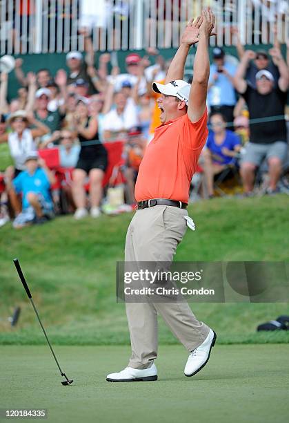 Scott Stallings reacts after making a birdie putt on the first playoff hole to win The Greenbrier Classic at The Old White TPC on July 31, 2011 in...