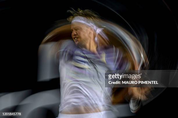 Picture done with slow shutter speed of Austria's Dominic Thiem returning the ball to Brazil's Felipe Meligeni during the ATP World Tour Rio Open...