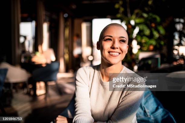 portrait of a smiling girl with short hair - bald girl stock pictures, royalty-free photos & images