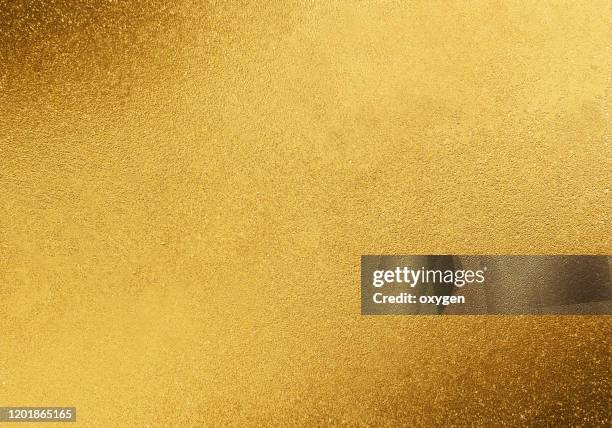 gold yellow sparkling background - irregular texturizado fotografías e imágenes de stock