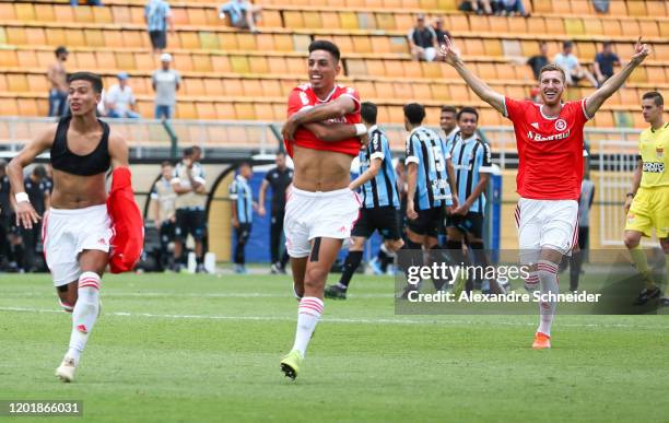 Players of Internacional celebrate after winning the final match against Gremio for the Copa Sao Paulo de Futebol Junior Final at Pacaembu Stadium on...