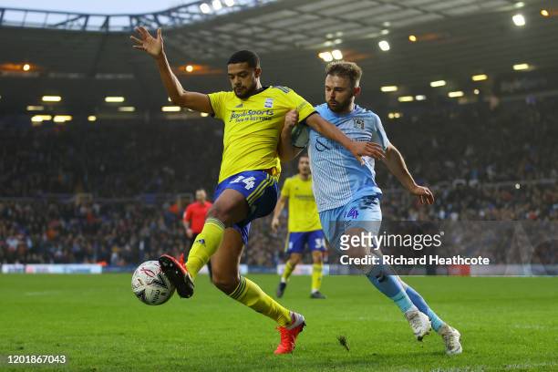 Jake Clarke-Salter of Birmingham City battles for possession with Matthew Godden of Coventry City during the FA Cup Fourth Round match between...