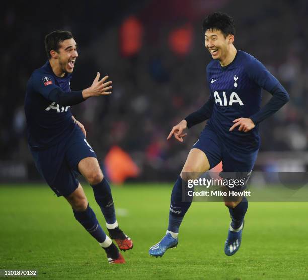Heung-Min Son of Tottenham Hotspur celebrates with teammate Harry Winks after scoring his team's first goal during the FA Cup Fourth Round match...