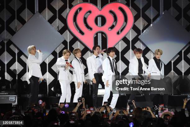 Suga, Jin, Jungkook, RM, Jimin, and J-Hope of BTS performs during the iHeartRadio KIIS FM's Jingle Ball show at the Forum on December 06, 2019 in...