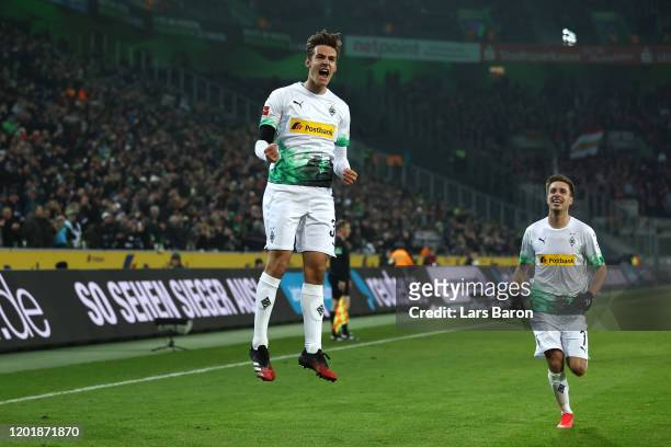 Florian Neuhaus of Borussia Monchengladbach celebrates after scoring his team's third goal during the Bundesliga match between Borussia...