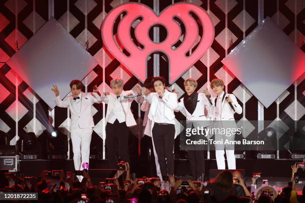 Suga, Jin, Jungkook, RM, Jimin, and J-Hope of BTS performs during the iHeartRadio KIIS FM's Jingle Ball show at the Forum on December 06, 2019 in...