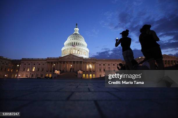 The U.S. Capitol building is illuminated on July 31, 2011 in Washington, DC. U.S. President Barack Obama announced that congressional leaders had...