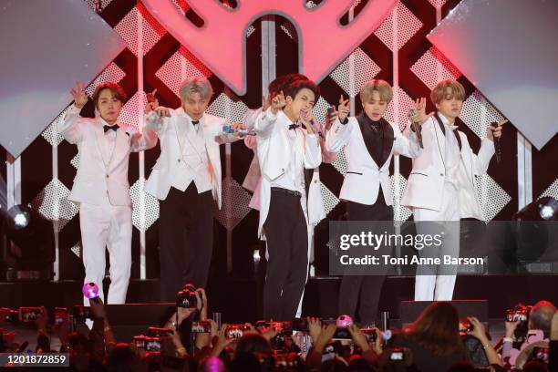 Suga, Jin, Jungkook, RM, Jimin, and J-Hope of BTS performs during the iHeartRadio KIIS FM's Jingle Ball show at the Forum on December 06, 2019 in...