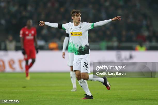 Florian Neuhaus of Borussia Monchengladbach celebrates after scoring his team's third goal during the Bundesliga match between Borussia...