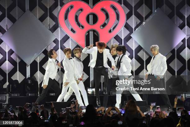 Suga, Jin, Jungkook, RM, Jimin, and J-Hope of BTS performs during the iHeartRadio KIIS FM's Jingle Ball show at the Forum on December 06, 2019 in...