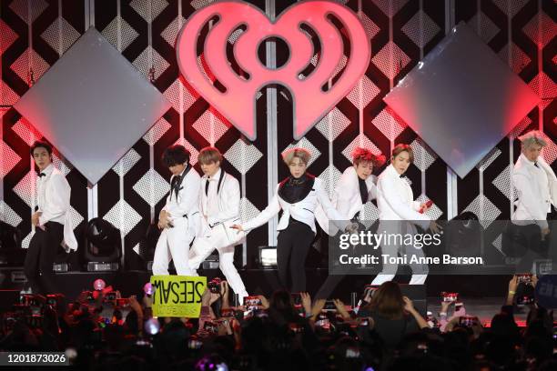 Suga, Jin, Jungkook, RM, Jimin, and J-Hope of BTS performs during the iHeartRadio KIIS FM's Jingle Ball show at the Forum on December 06, 2019 in...