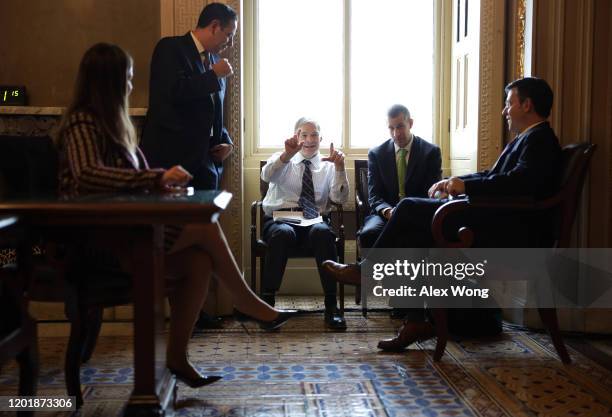 Rep. Jim Jordan gestures as Rep. Elise Stefanik , counsel Steve Castor , and Rep. Mike Johnson look on prior to the Senate impeachment trial against...