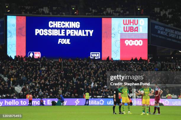 Screen inside the stadium displays the decision to conduct a VAR review following a possible penalty incident during the FA Cup Fourth Round match...