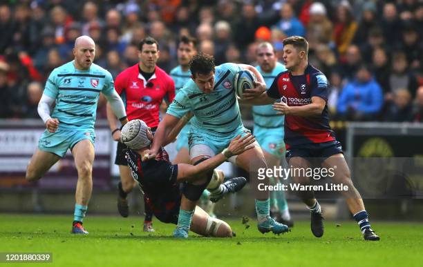 Val Rapava Ruskin of Gloucester Rugby is tackled by Dave Attwood of Bristol Bears during the Gallagher Premiership Rugby match between Bristol Bears...