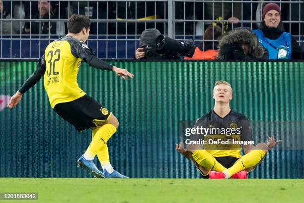 Erling Haaland of Borussia Dortmund celebrates after scoring his team's first goal during the UEFA Champions League round of 16 first leg match...