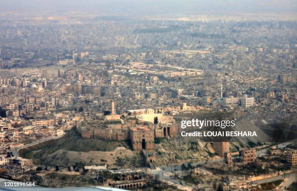 An aerial view of the Citadel of the Syrian city of Aleppo is shown in a picture taken on February 19 aboard the first flight from the capital...