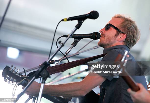 Dave Simonett of Trampled by Turtles performs during the 2011 Newport Folk Festival at Fort Adams State Park on July 31, 2011 in Newport, Rhode...