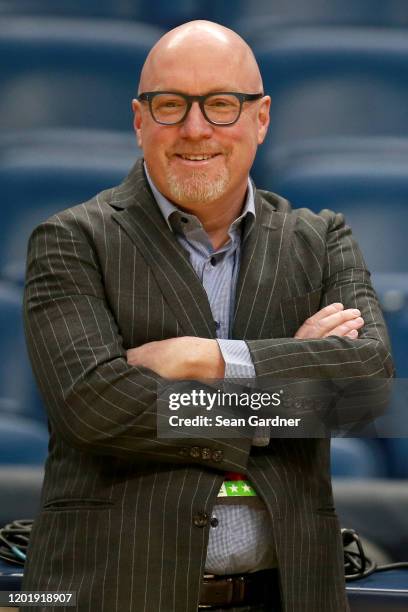 Vice President of basketball operations for the New Orleans Pelicans David Griffin stands ont the court prior to the start of a NBA game against the...