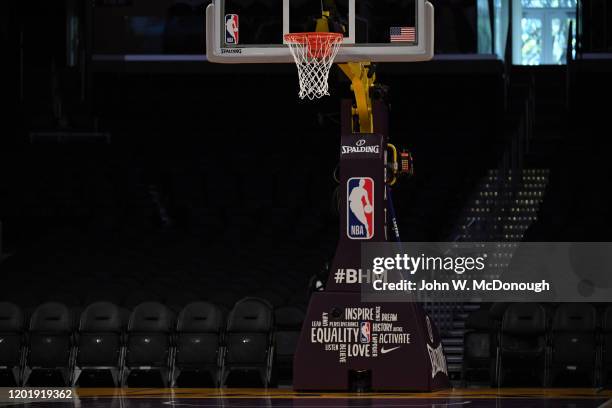 View of basketball stanchion that reads #BHM EQUALITY, INSPIRE, ACTIVATE, LEAD, UNIFY, PERSERVERANCE for Black History Month before Los Angeles...