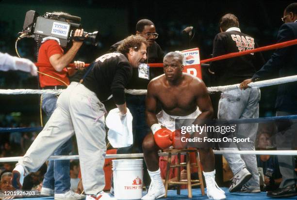Buster Douglas and Mike Williams fight during heavyweight match on June 27, 1988 at the Convention Hall in Atlantic City, New Jersey. Douglas won the...
